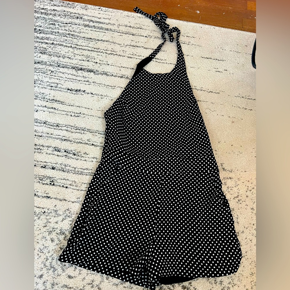 Lucy Paris black and white polka dot romper in a size M.